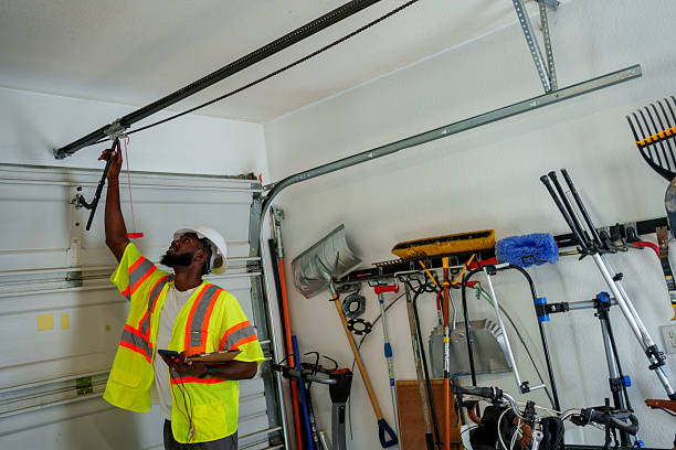 Professional Garage Door Panel Replacement technician working in Plainview, TX